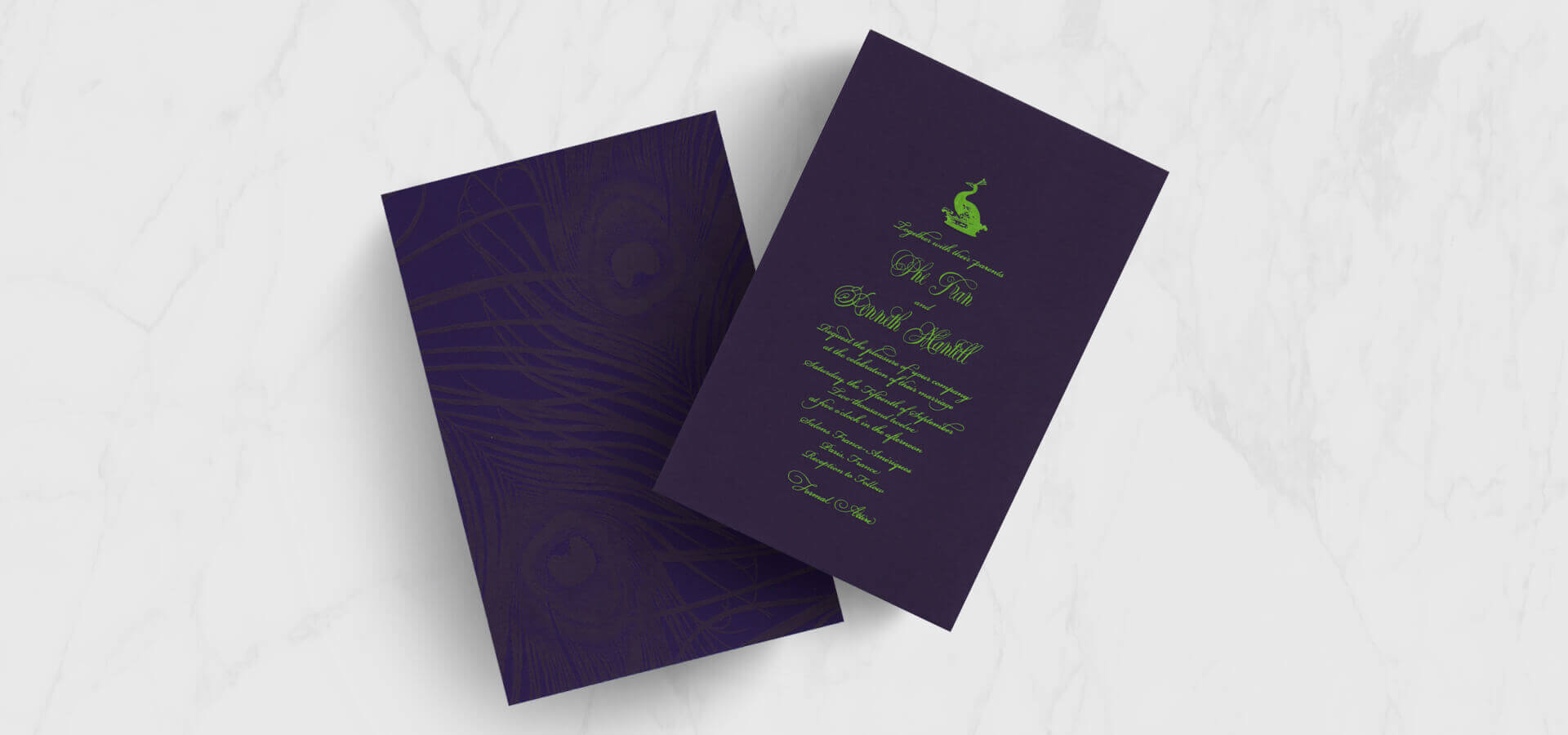 Purple and green peacock wedding invitations