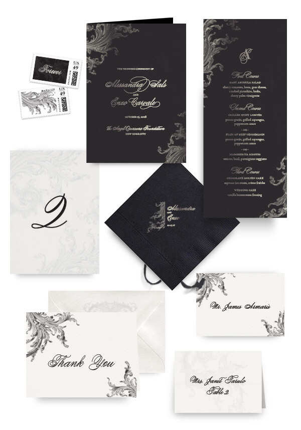 Dark ornate napkins, table cards, escort and place cards