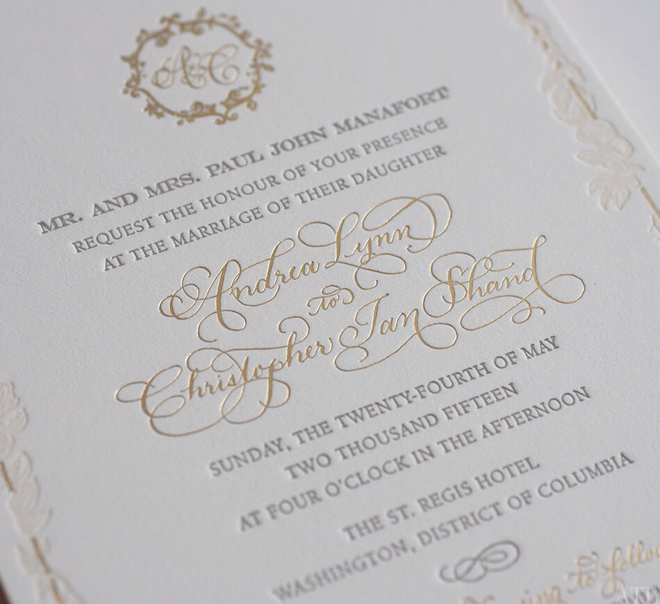 Gold calligraphy lettering on a classic invite