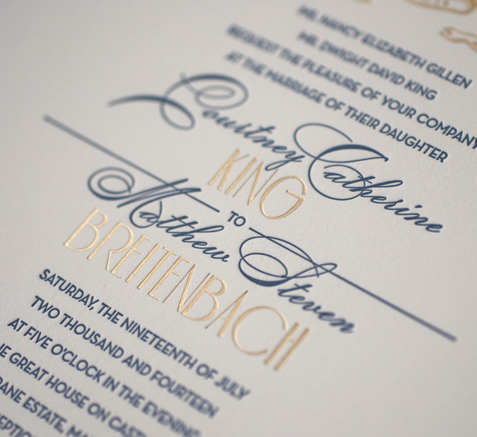 Gold foil and navy letterpress typography