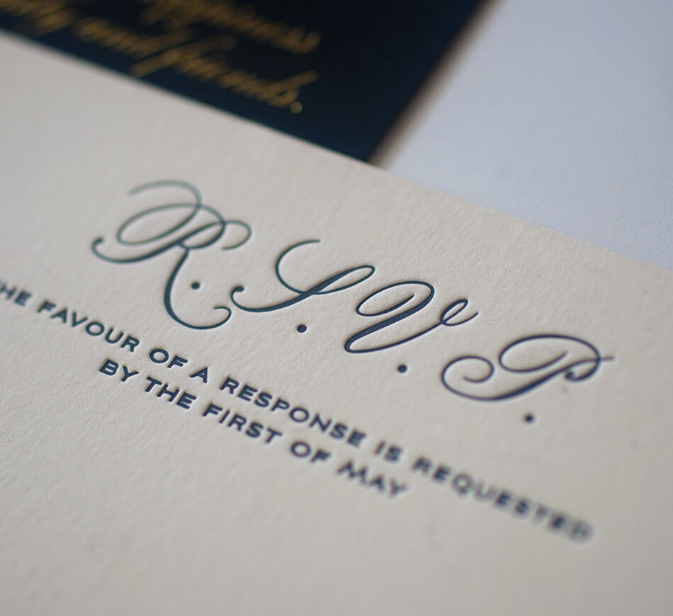Black letterpress reply card typography