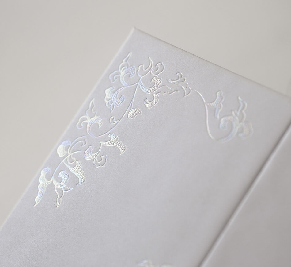 Mother of pearl wedding invitation detail