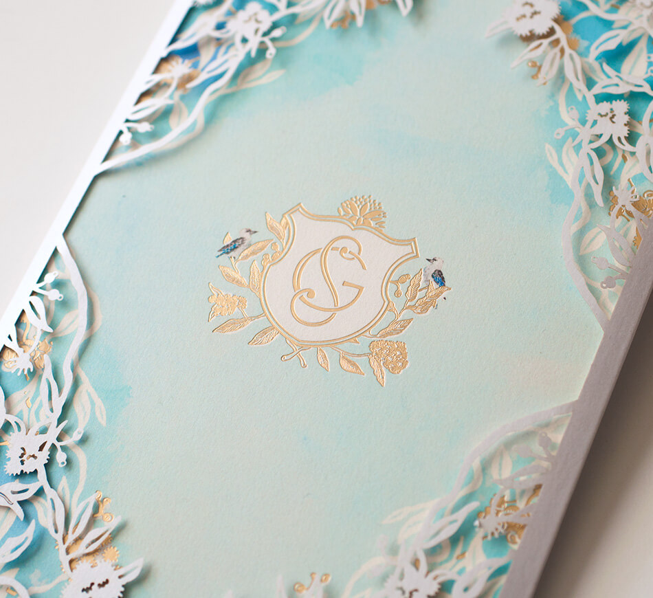 Watercolor and laser cut wedding invitation