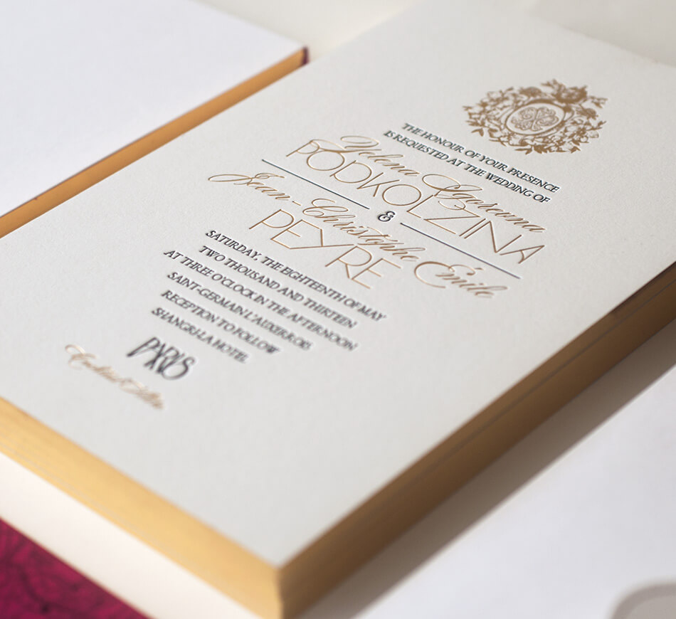 Contemporary wedding invitation with gold edges