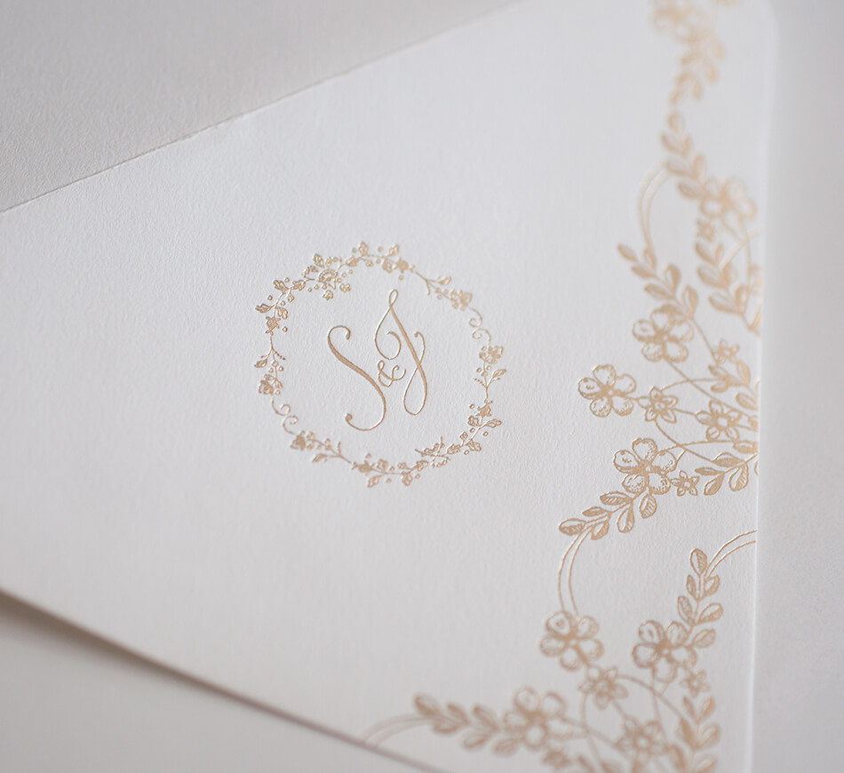 Gold foil stamped flowers and lettering