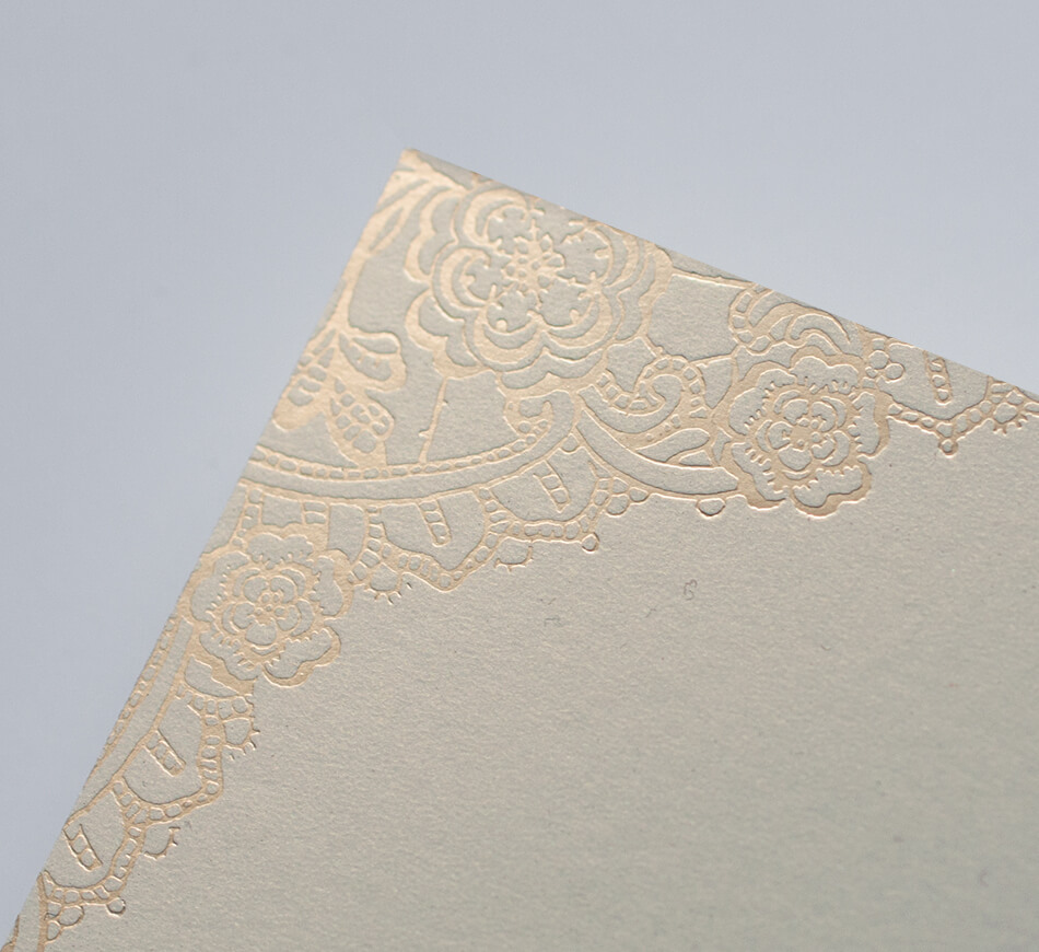 Lace detail printed in gold foil