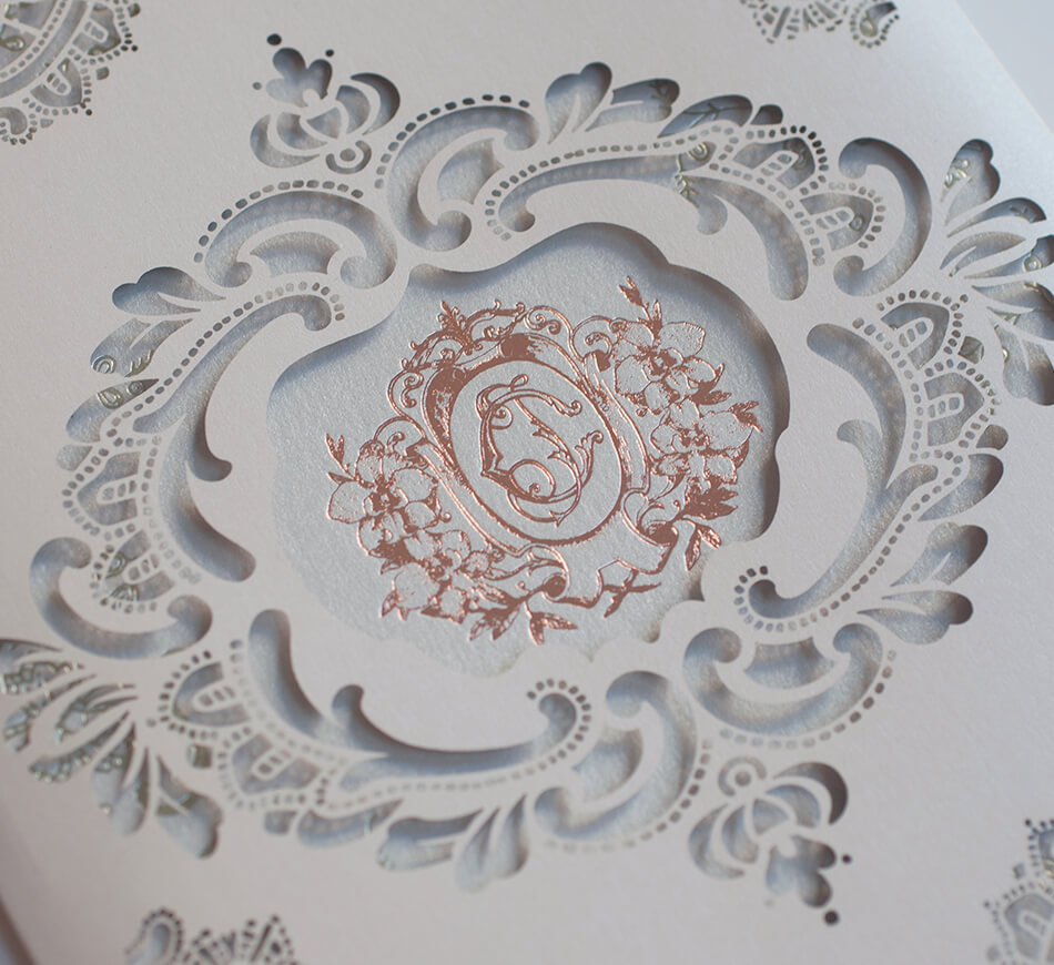 Laser cut lace wedding invitation detail