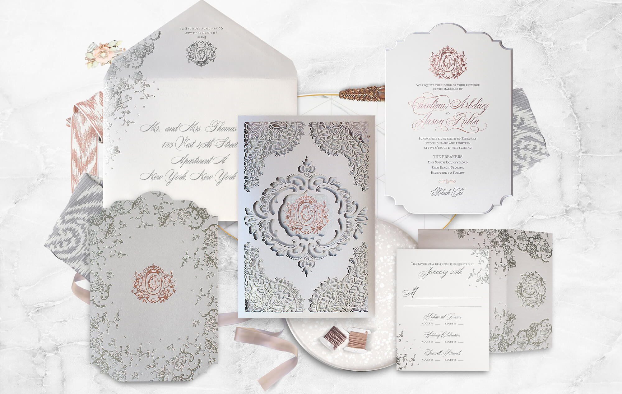 Ornate laser cut lace and rose gold wedding invitation