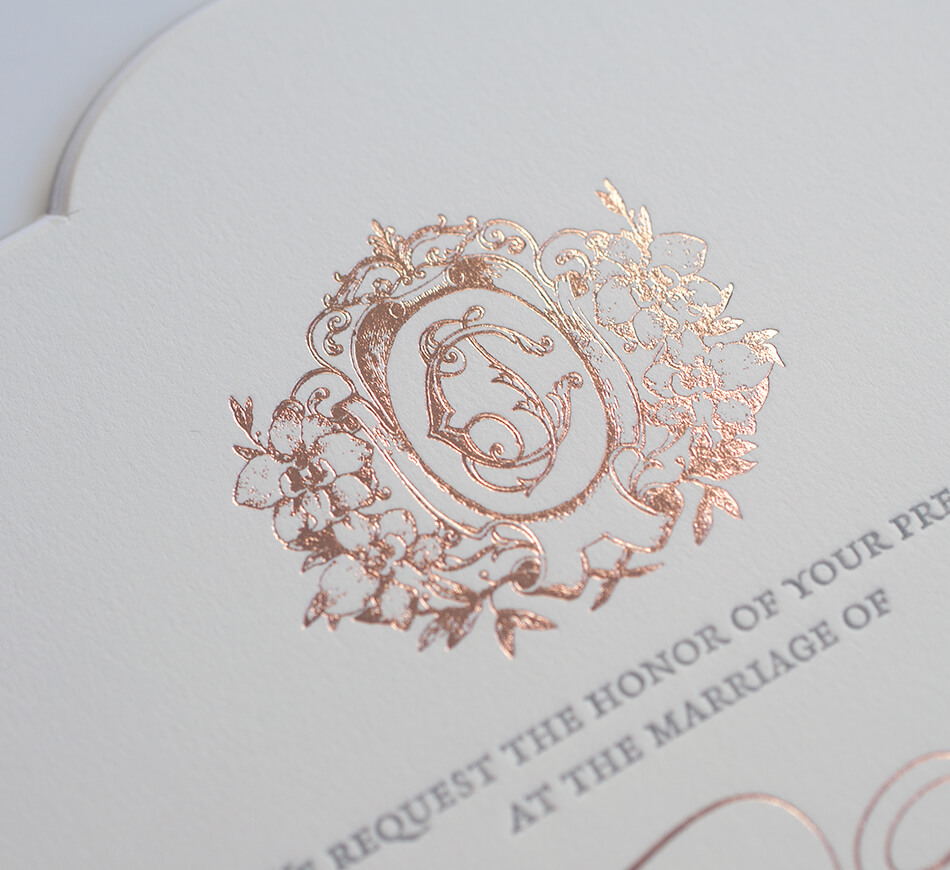 Orchid and monogram crest in rose gold foil