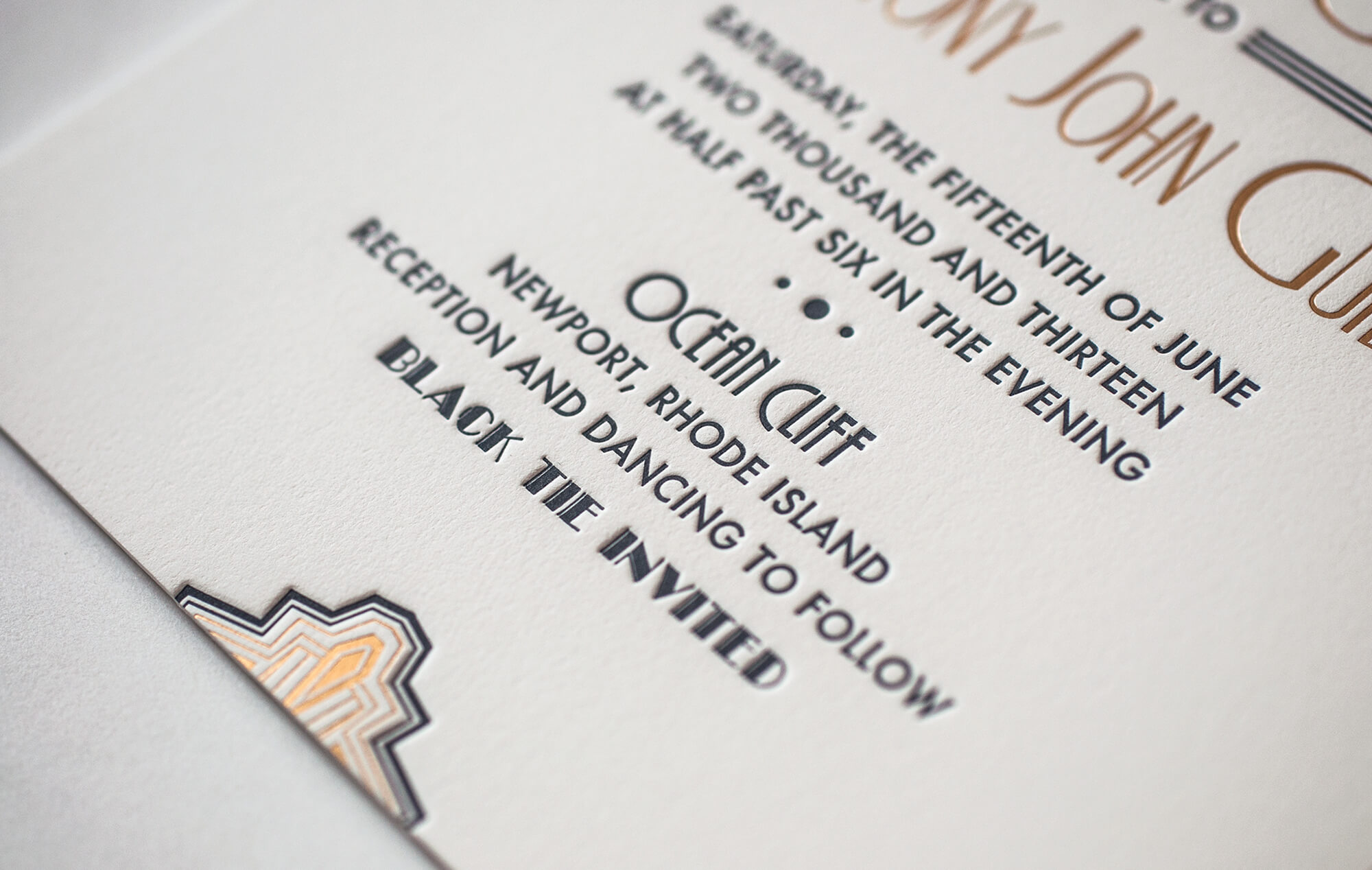 Gold foil and letterpress invitation detail