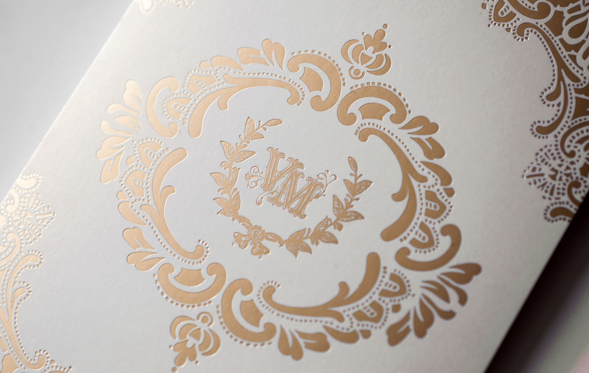 Gold foil monogram and ornate lace border