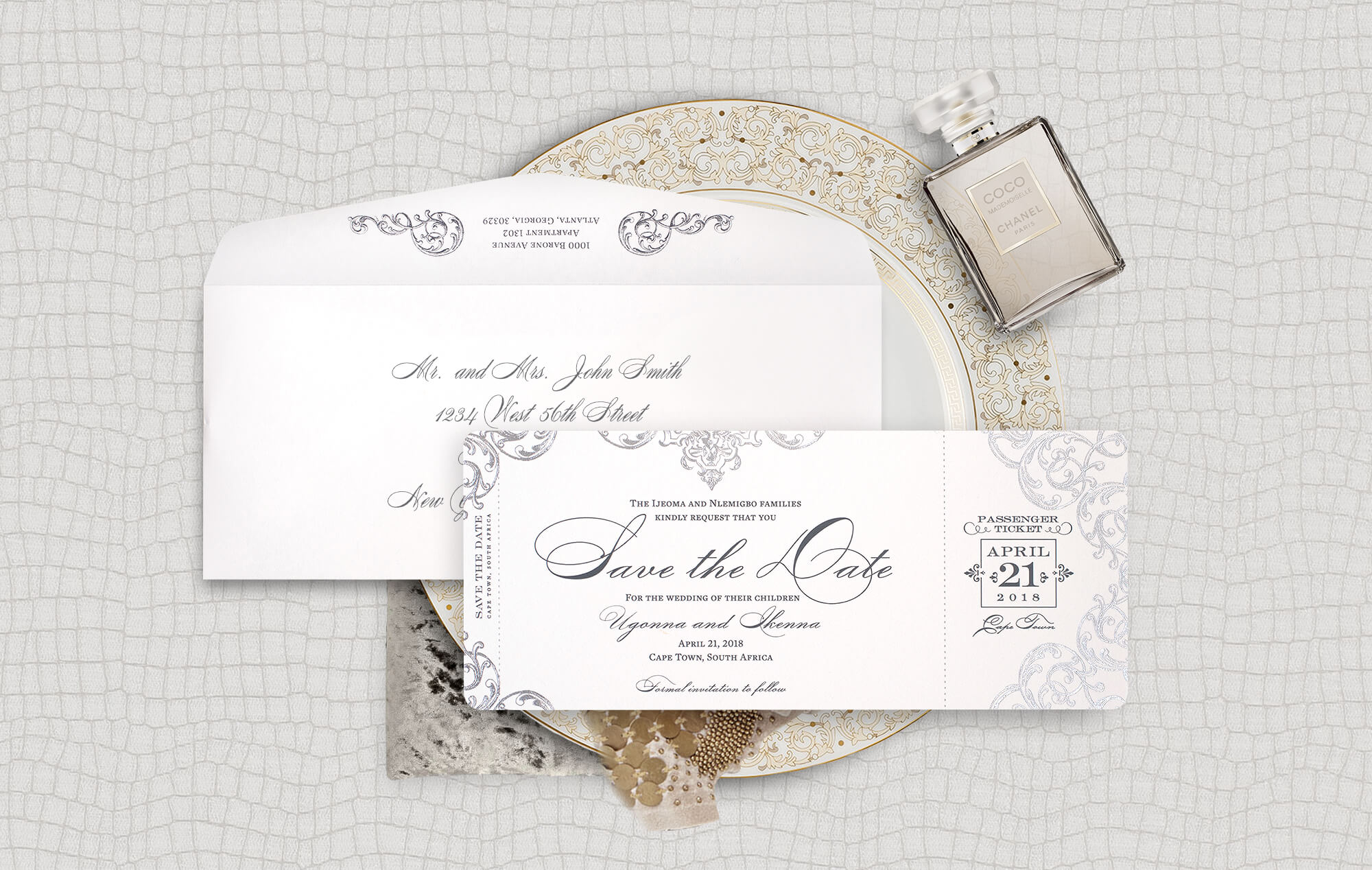 Ornate silver boarding pass save the date