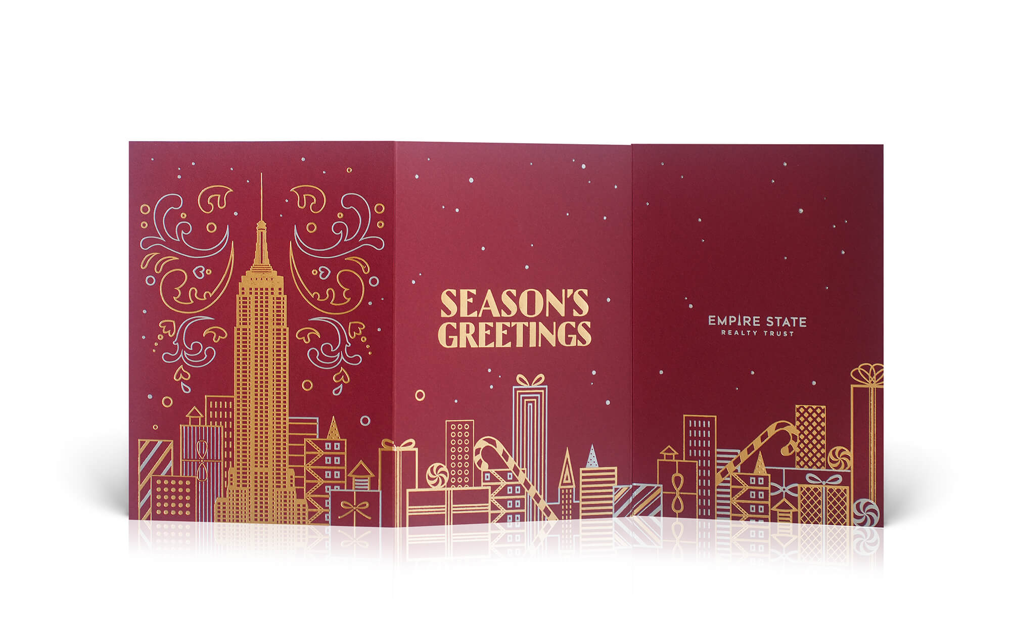 Holiday card with a festive skyline of presents