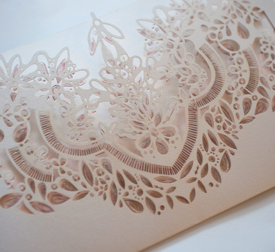 Blush laser cut invitation sleeve