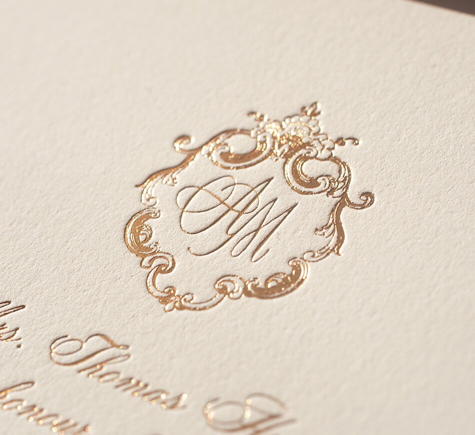 Calligraphy monogram with shell border