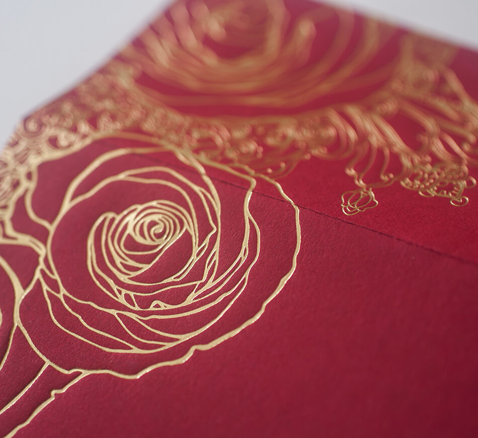 Gold rose on red envelope