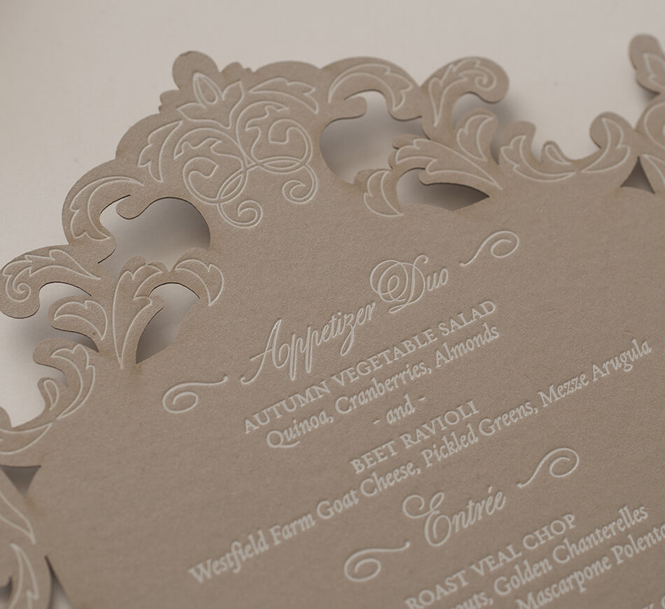 Laser cut menu inspired by a Venetian mirror