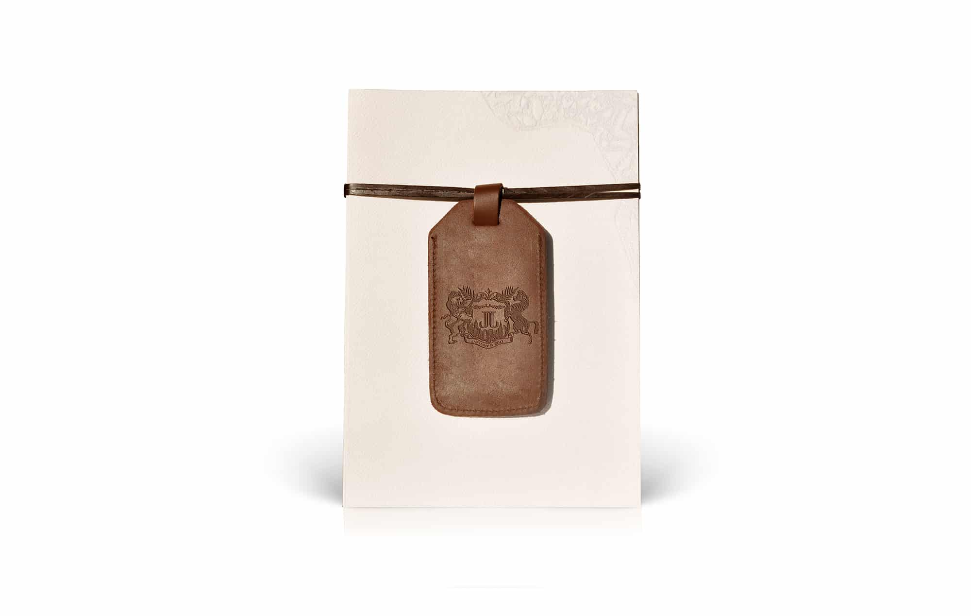 Leather wedding invitation with custom luggage tag