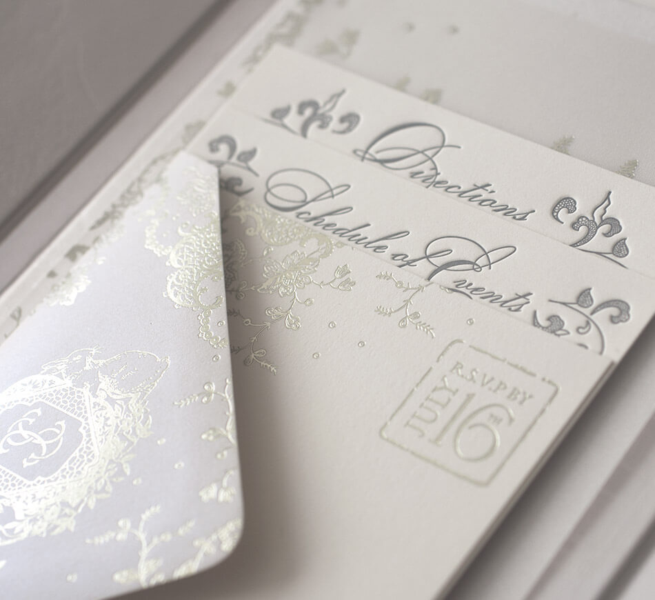 Letterpress and foil stamped enclosure cards