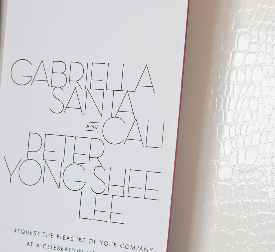 Modern wedding invitation with crocodile embossed paper