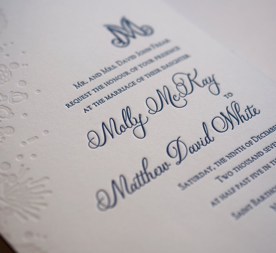 Navy letterpress calligraphy on cotton paper