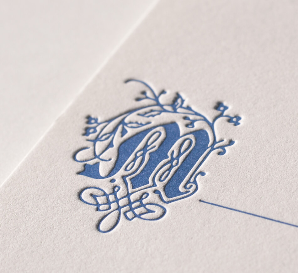 Blue letterpress drop cap