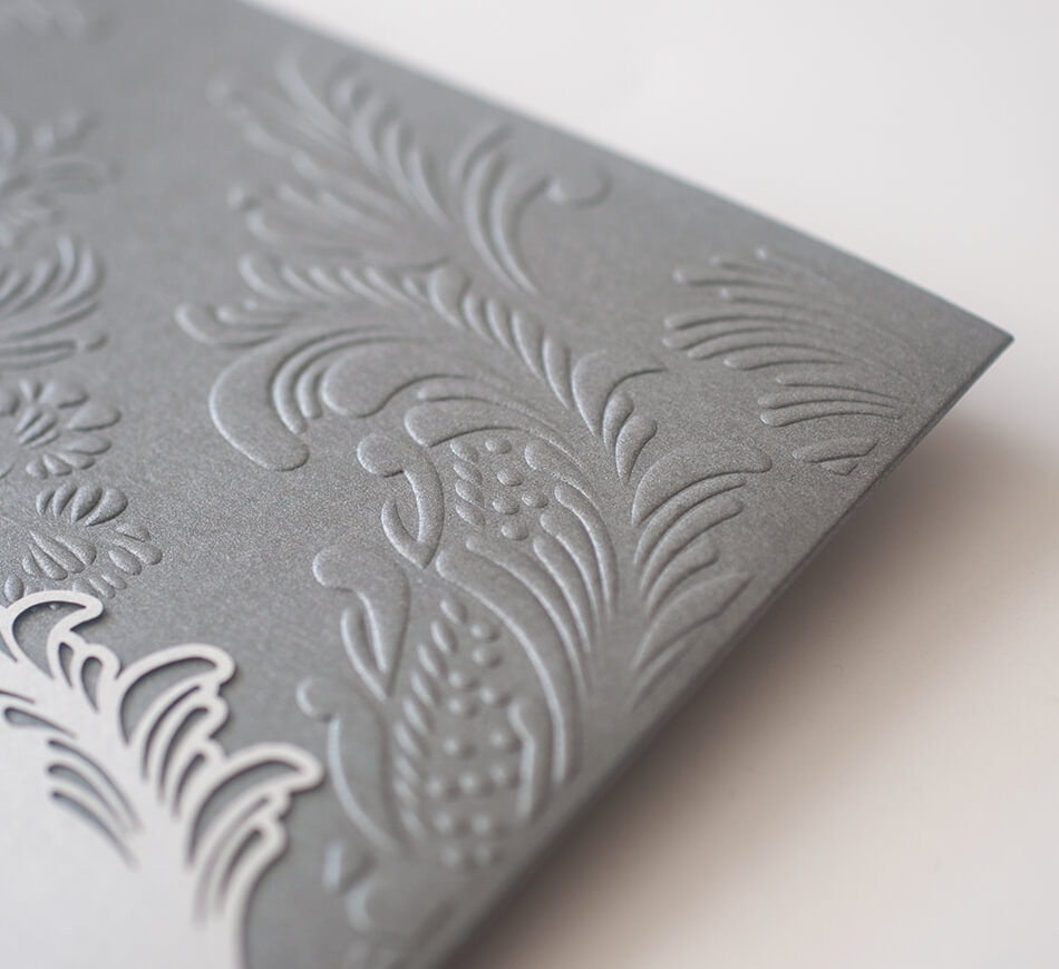 Embossed ornate flourishes