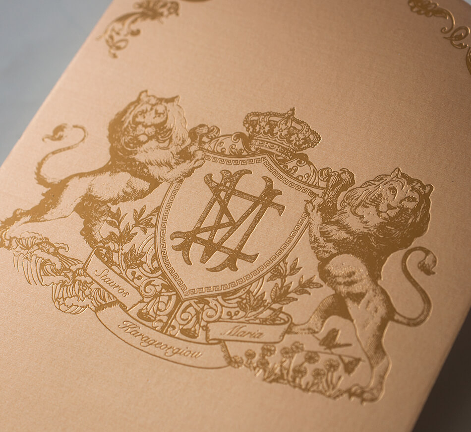 Gold on gold lion crest on back of invitation