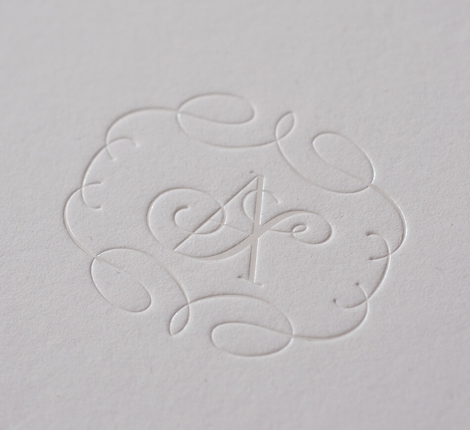 Pearl foil monogram and flourished border