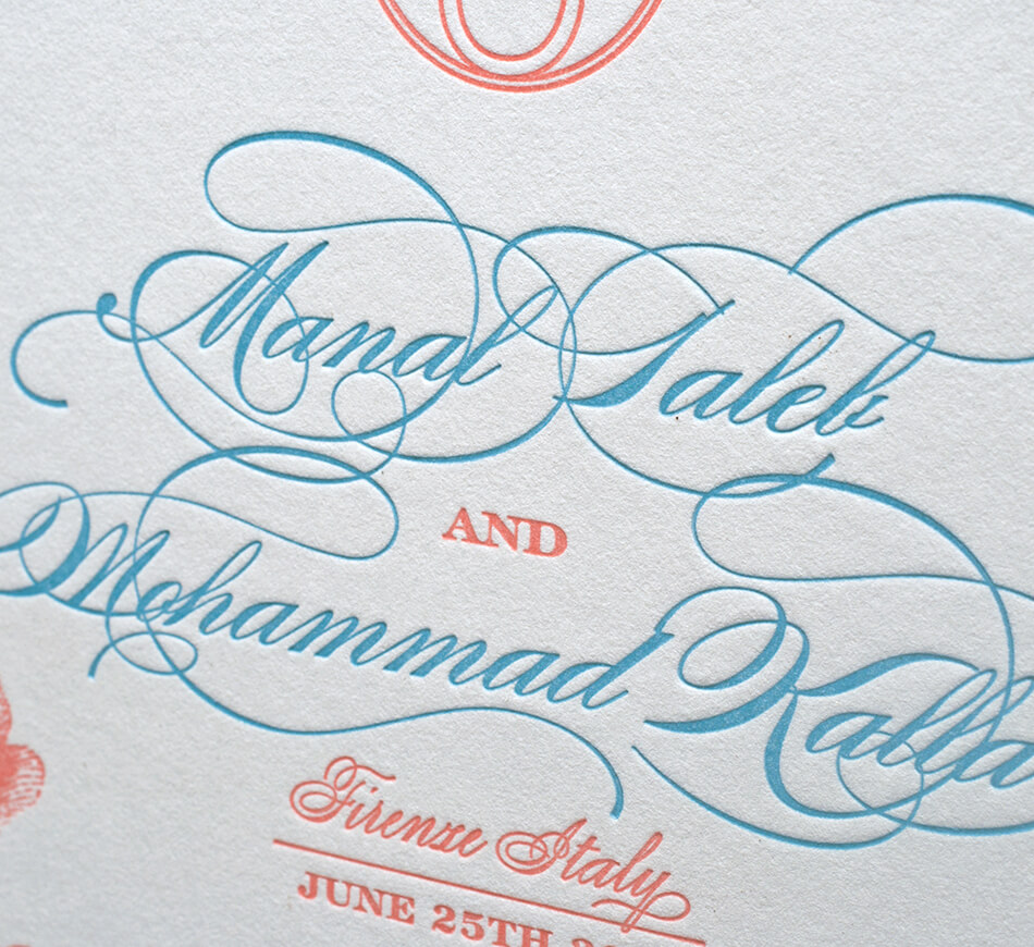 Turquoise and coral script detail