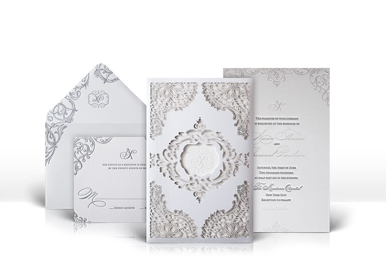 White laser cut wedding invitation