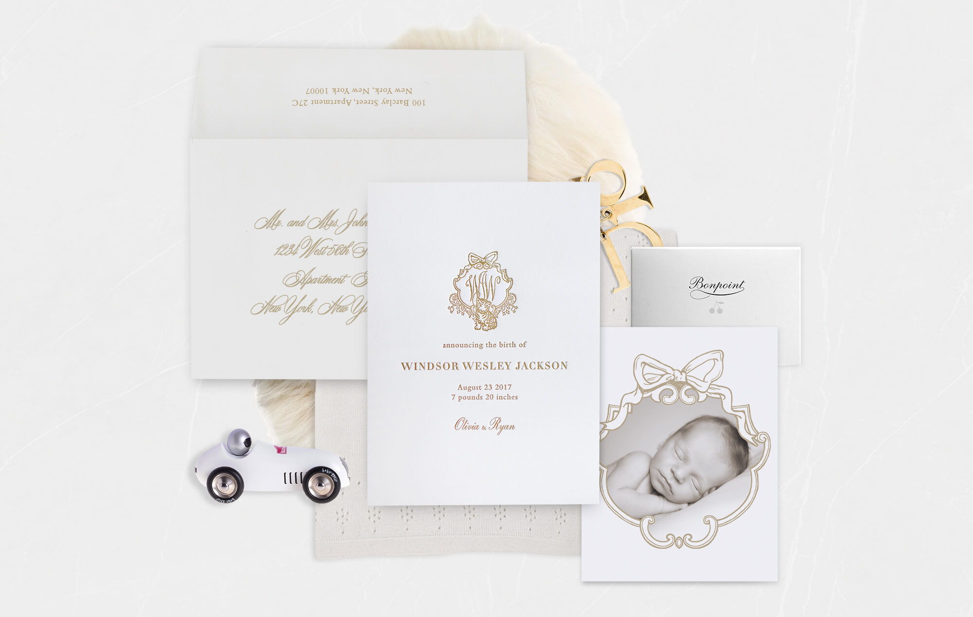 Luxe baby announcement printed in gold letterpress