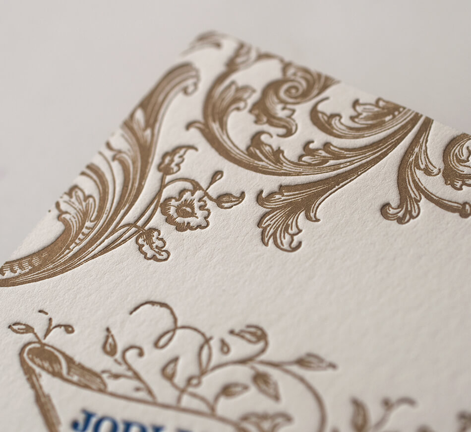 Gold letterpress scrollwork