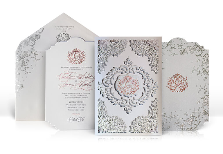 Ornate laser cut lace and rose gold wedding invitation