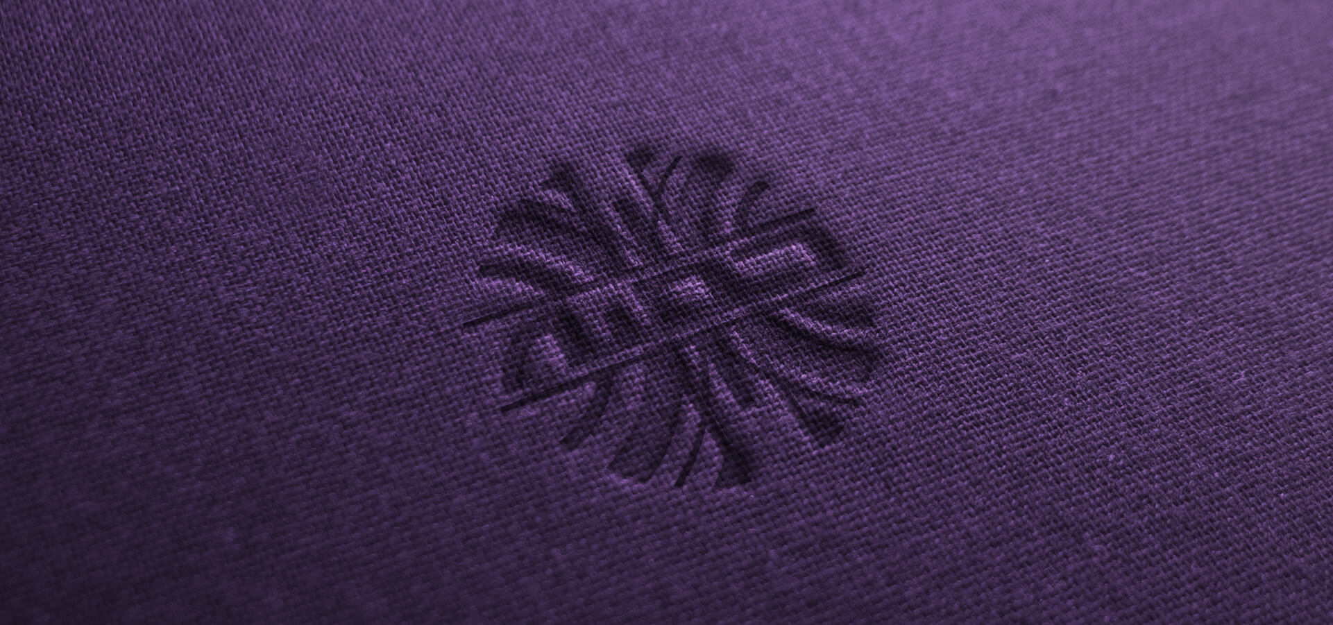 Embossed company logo