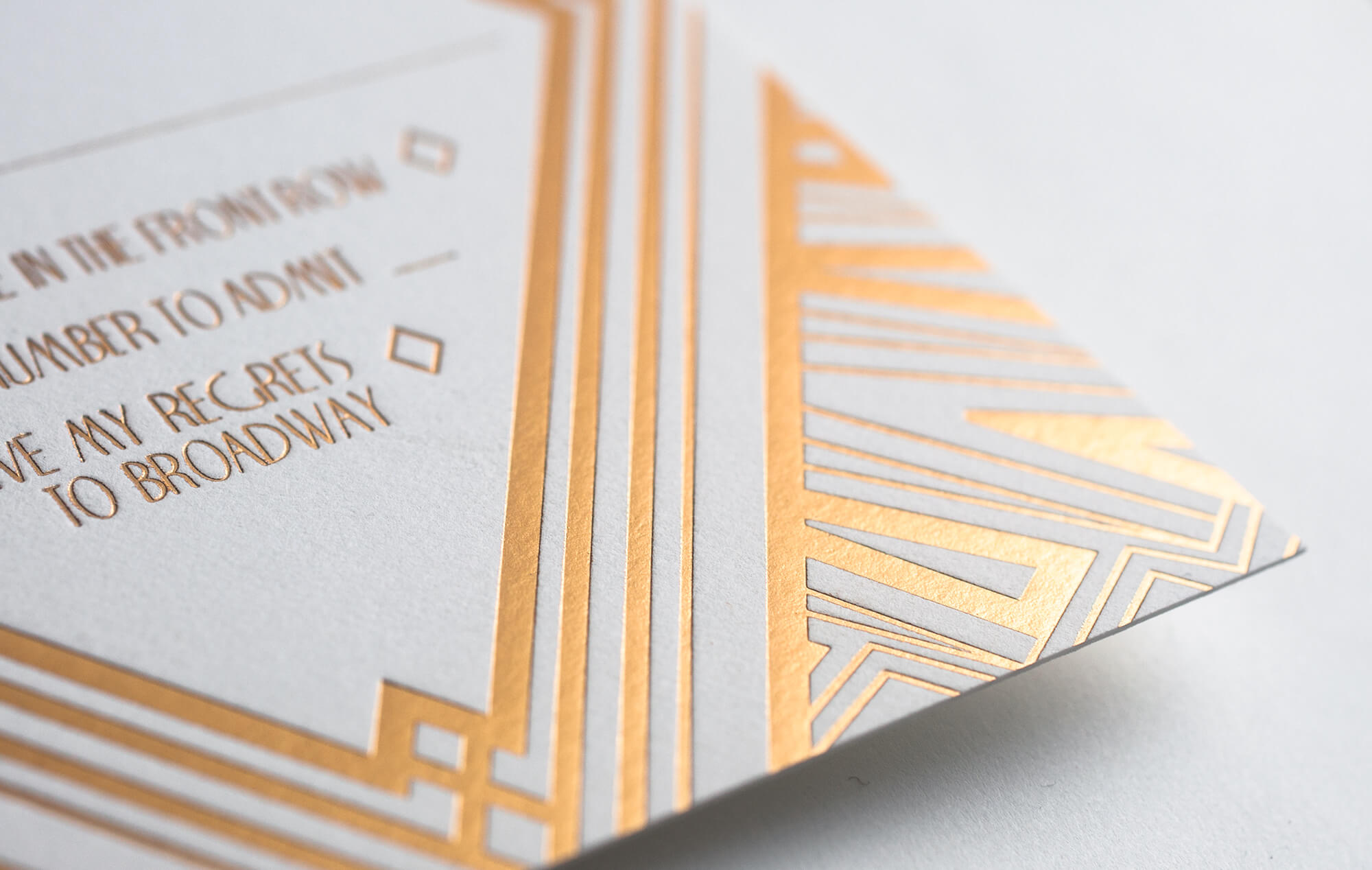 Gold foil art deco linework