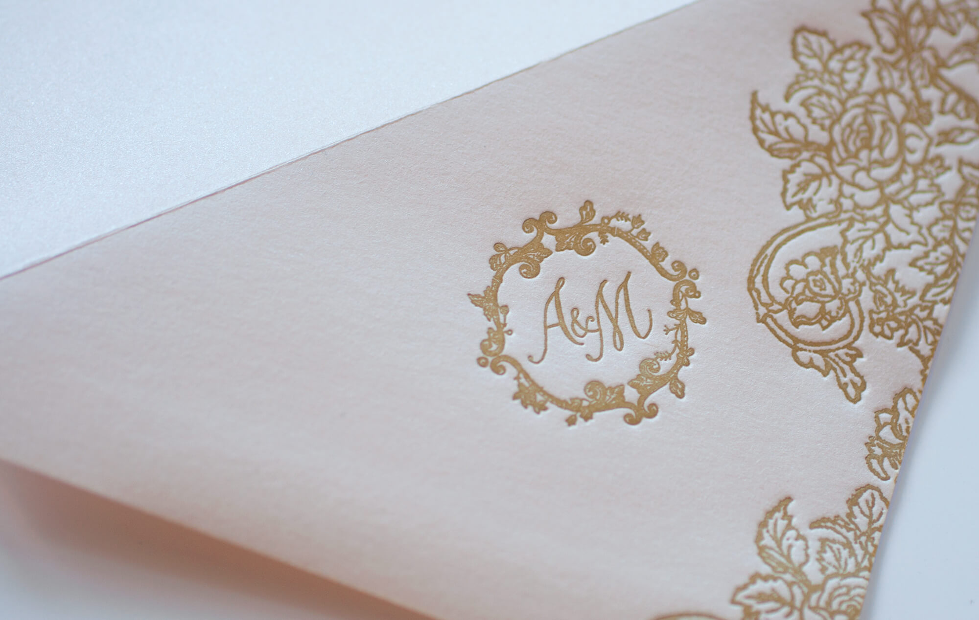 Gold letterpress monogram and border