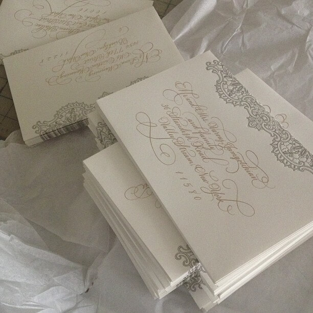 Hand calligraphy on letterpress envelopes