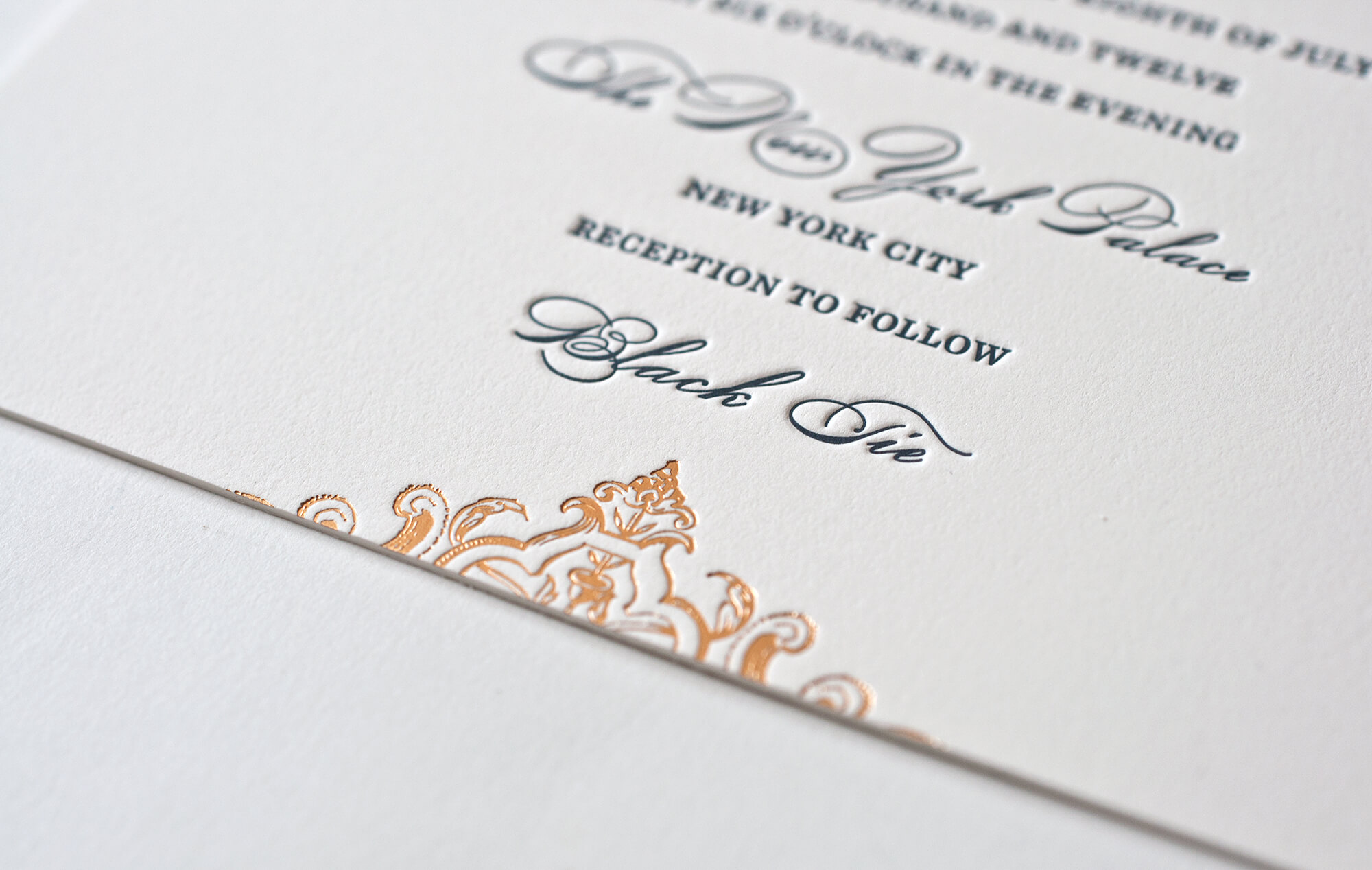 Letterpress and foil invitation detail