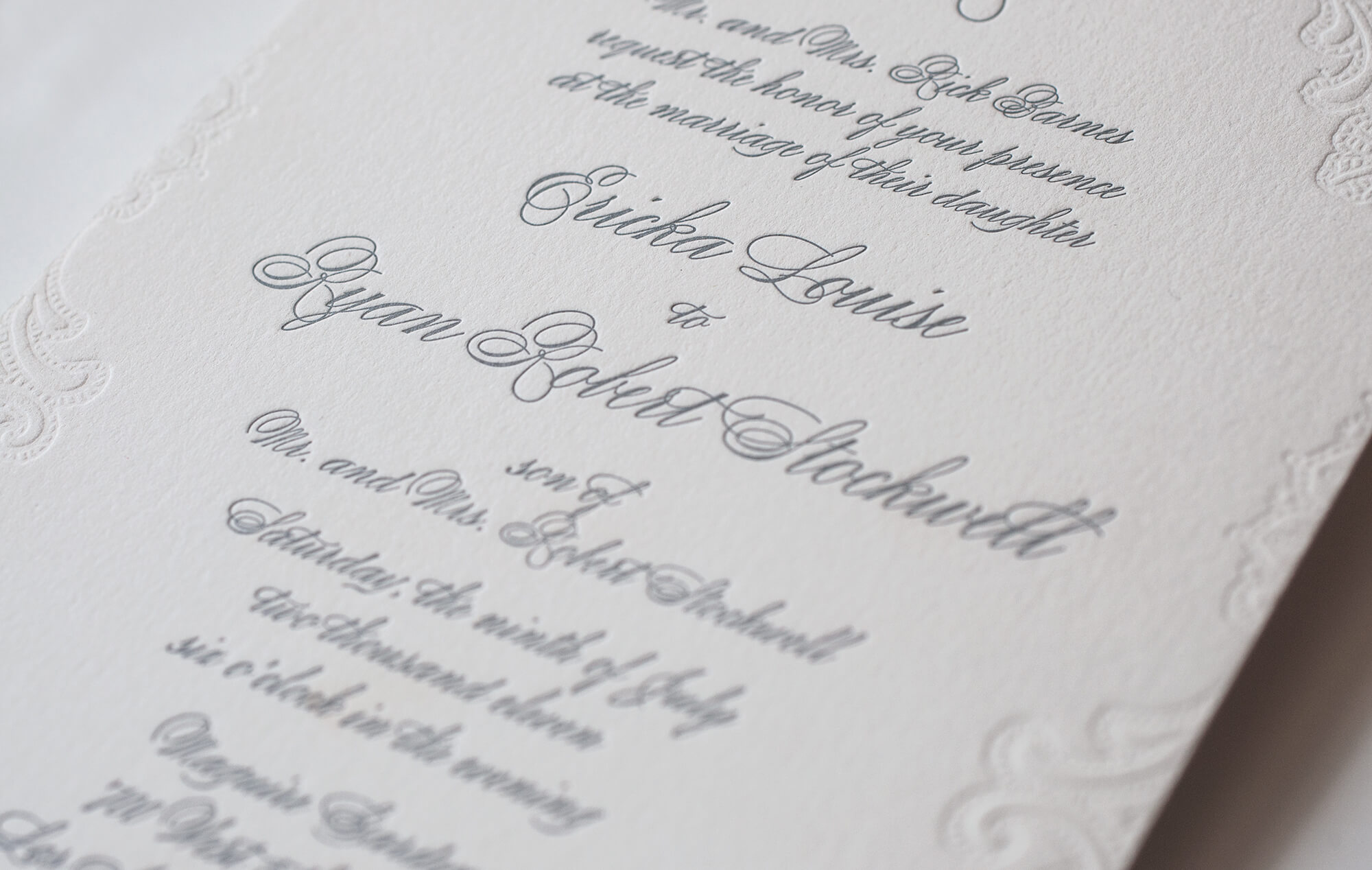 Letterpress grey calligraphy script