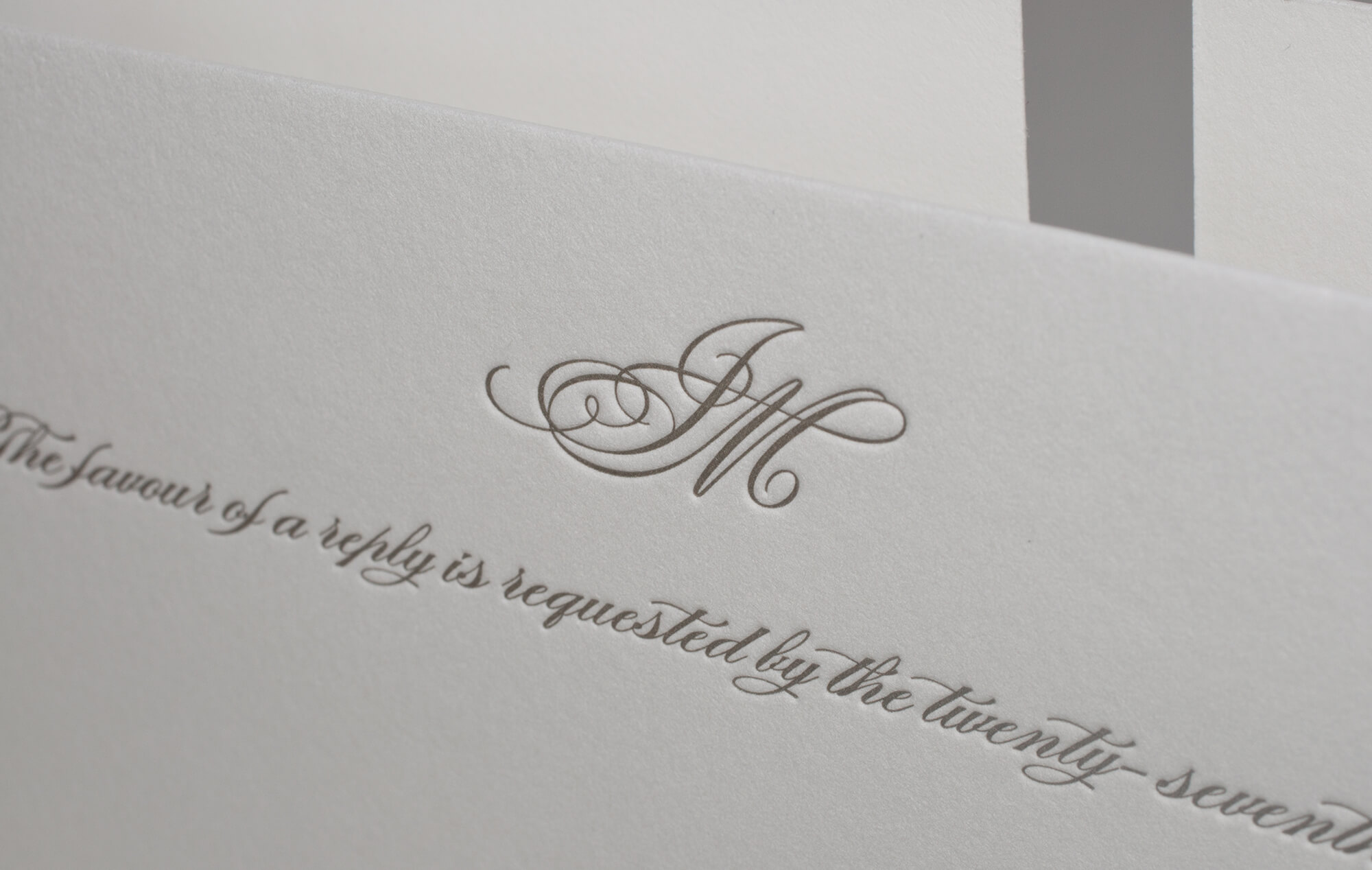 Letterpress script monogram