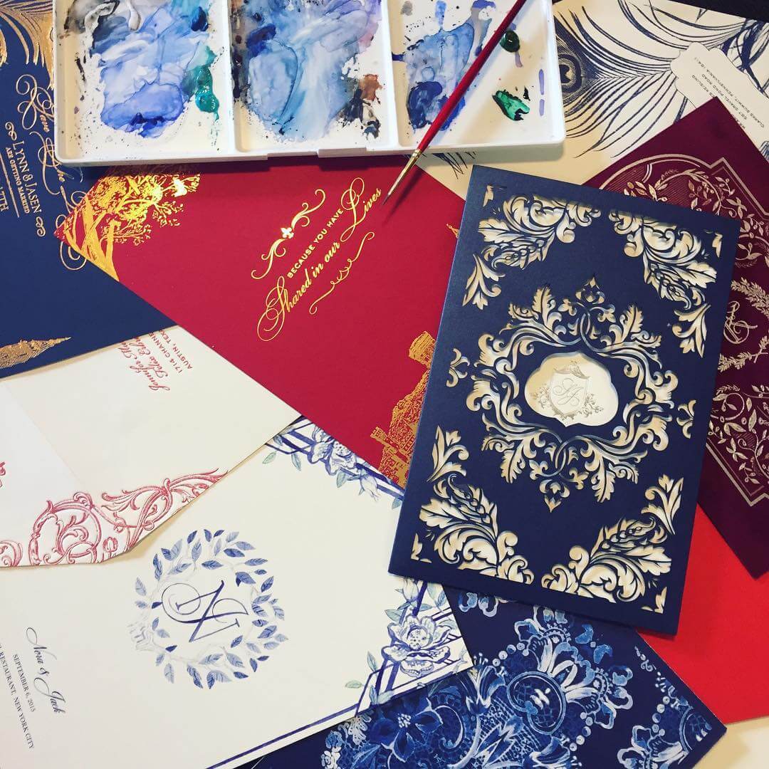 Red, blue and white wedding invitations