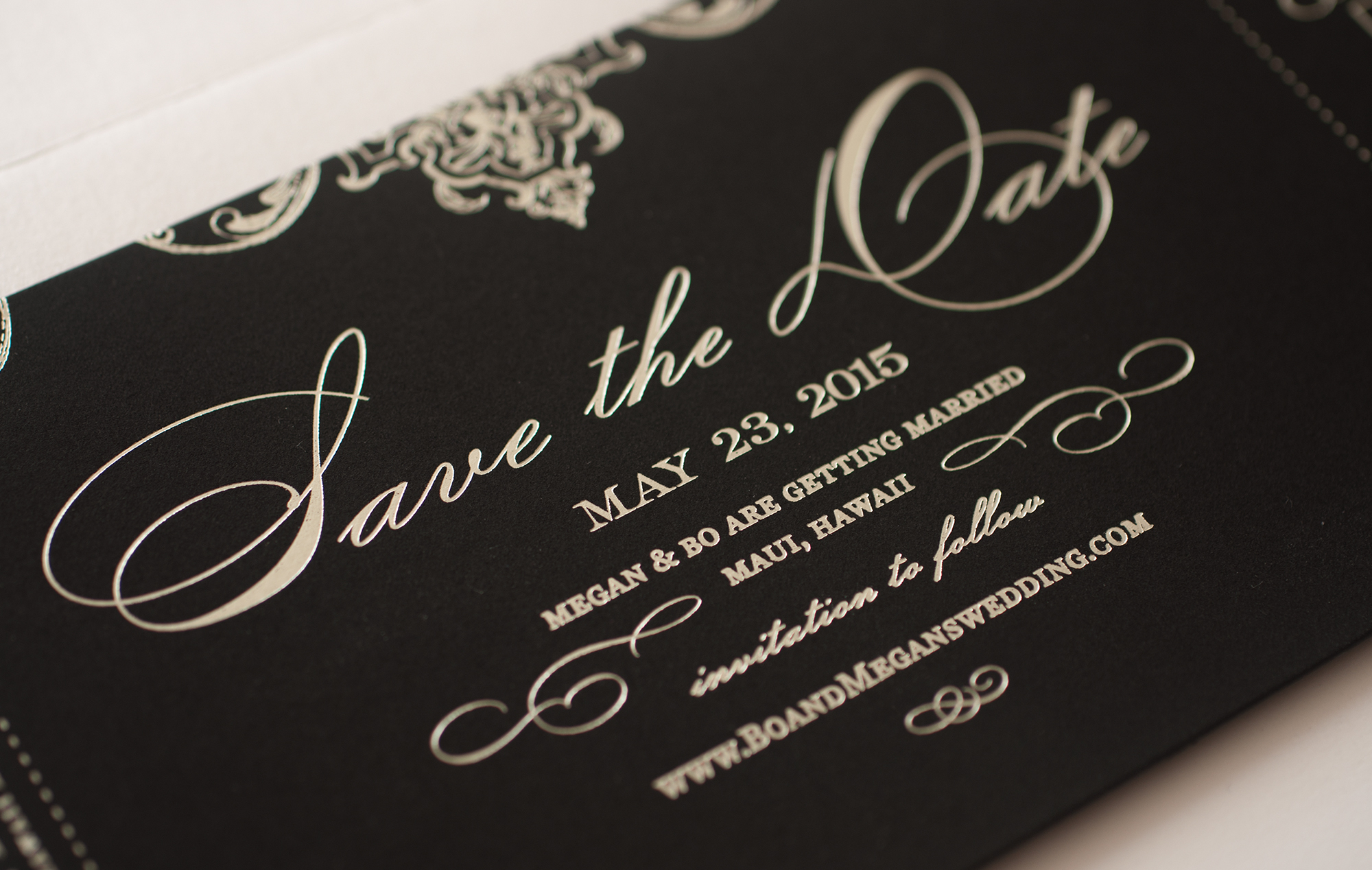 Silver foil stamping on black paper