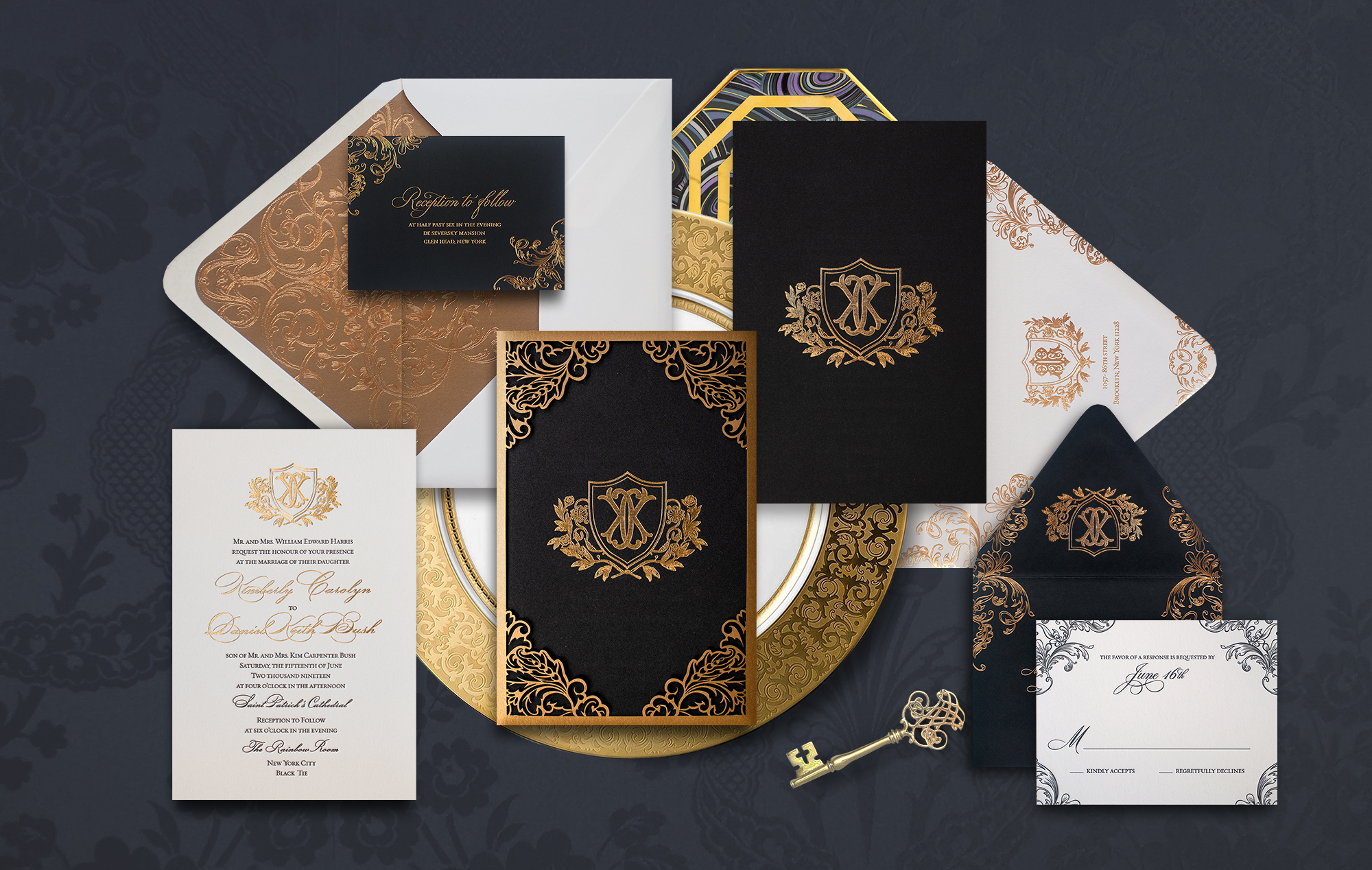 Ornate black and gold wedding invitation